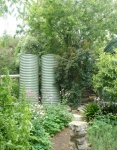 We added 3 tall steel tanks to harvest water from the shed