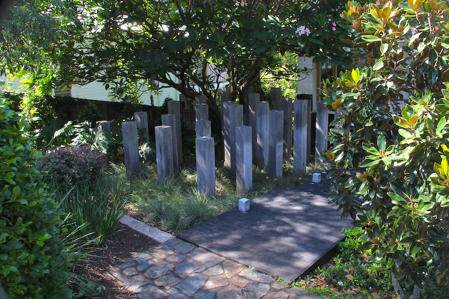 Timber sculpture in garden by Clare James Landscape Design