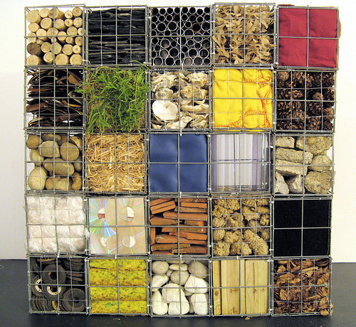 Gabion cages with various fill materials by Natasha Carsberg