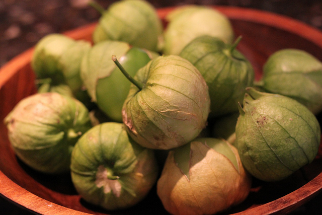 Tomatillos with husk Photo by Gudlyf