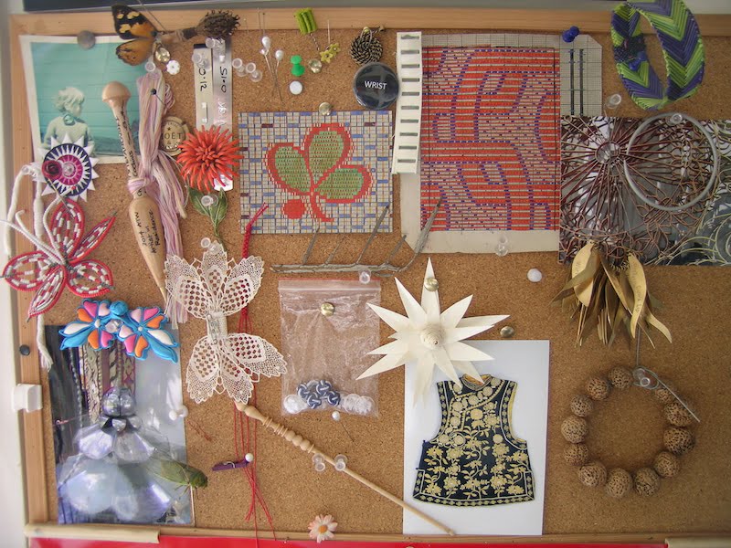 Pin board above Vicki's work bench with items of inspiration